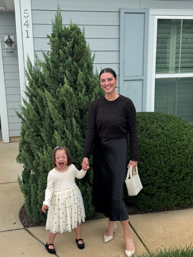 Adeline and Jess outdoors with happy smiles