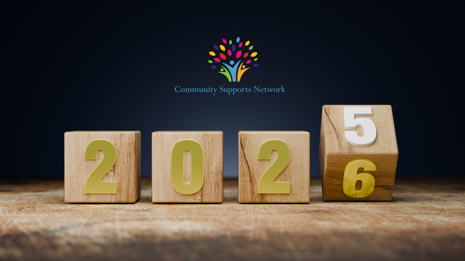 Image showing wooden cubes with one digit in each, showing year number 2025 changing to 2026, which means that the holidays have ended.  This relates to our topic in this blog post, which is about getting back into a routine while supporting individuals with special needs.
