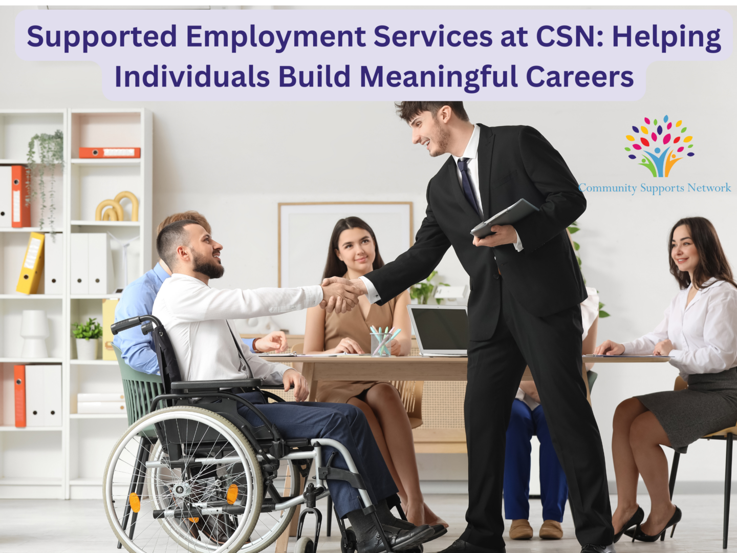 Image of people working together.  This is what we do as part of our Supported Employment services.