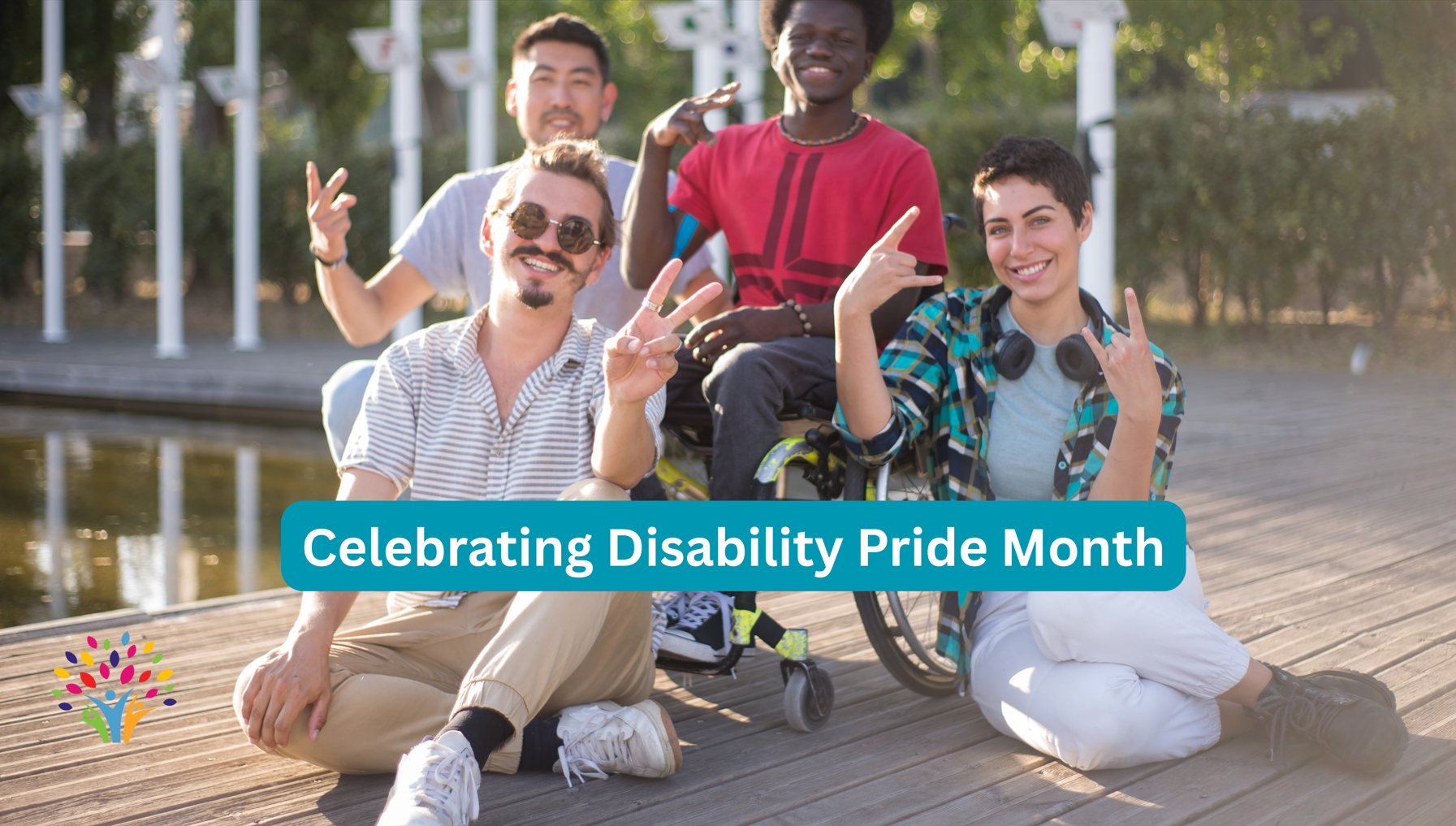 Photo of a group of people with disabilities celebrating Disability Pride Month, which is in July of every year. This image is central to the topic of this post about celebrating the occasion in this year 2026.